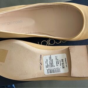 Sergio Rossi all leather flats, never worn, price tags and original packaging